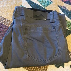 Wrangler all-terrain jeans size 38/32. Color is a dark charcoal gray.